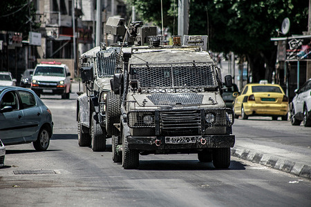 Israeli military vehicles seen in the middle of the market in the city of Tulkarm during the raid to assassinate Palestinians in the city of Tulkarm in the northern West Bank.