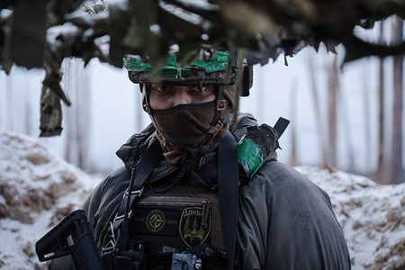 A Ukrainian soldier is seen on duty in a trench in the Donetsk region. With a lack of ammunition and military personnel, Ukraine is having a hard time on its frontline as the war between Ukraine and Russia continues.