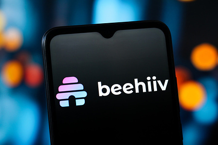 In this photo illustration, the Beehiiv logo is seen displayed on a smartphone screen.