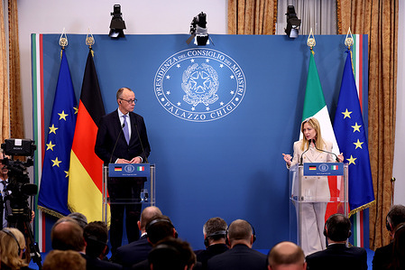 Prime Minister Giorgia Meloni (R) i and German Chancellor Friedrich Merz (L) seen during the final press conference. Prime Minister Giorgia Meloni attends the Intergovernmental Summit between Italy and Germany, meeting with German Chancellor Friedrich Merz in Rome's Villa Doria Pamphilj.