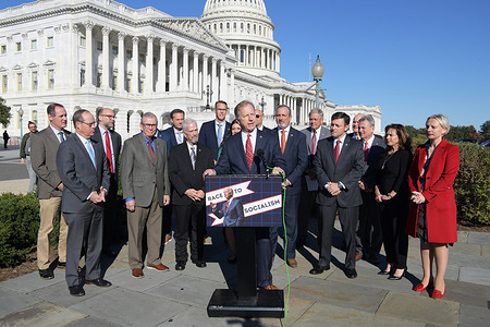 Representative Kevin Hern (R-OK) alongside House Republican members hold a press conference in response to OSHA's release of Biden's vaccine mandate for private businesses, at House Triangle/Capitol Hill.