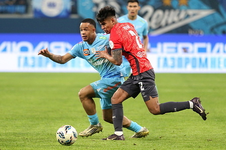 Yomar Rocha (2) of Akron, Pedro Henrique Silva dos Santos, known as Pedro (20) of Zenit seen in action during the Russian Premier League football match between Zenit Saint Petersburg and Akron Tolyatti at Gazprom Arena. Final score; Zenit 2:0 Akron.