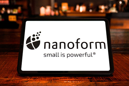 In this photo illustration, the logo of nanoform is displayed on the screen of a smart tablet.