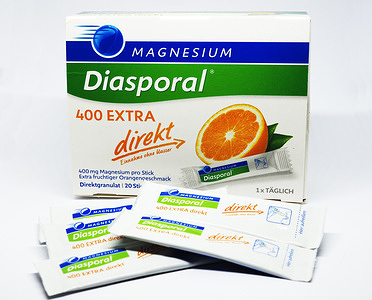 In this photo illustration, the Magnesium Diasporal 400 EXTRA direkt granules in a box and individual sachets. A popular German dietary supplement used to support muscle function and electrolyte balance.