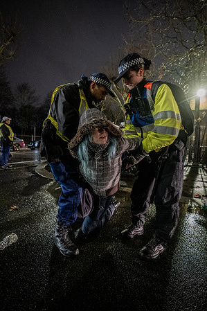 Pro-Palestinian activist is being arrested for trespassing onto the grounds of HMP Wormwood Scrubs prison during the demonstration. Scores of pro-Palestinian demonstrators protesting against the incarceration of Palestine Action activists at HMP Wormwood Scrubs were all arrested for aggravated trespassing onto prison property. The demonstrators were kettled in by Police who proceeded to arrest them one by one in a large operation that took 5 hours.