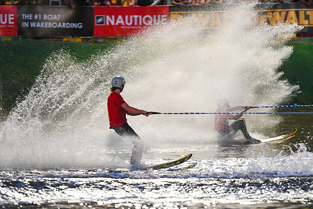 Waterskiing duo is performing tricks and jumps on Yarra river during Night Ski show at Moomba festival Moomba is Australia’s largest free community festival, held annually in Melbourne over the Labour Day long weekend in March. In 2025, it runs from March 6 to March 10 along the Yarra River, including Birrarung Marr and Alexandra Gardens. Known for its lively atmosphere and diverse activities, the festival has been a major event since its official launch in 1955. Its roots date back to 1951 when Melbourne celebrated fifty years of Federation with a parade and a theatrical production.