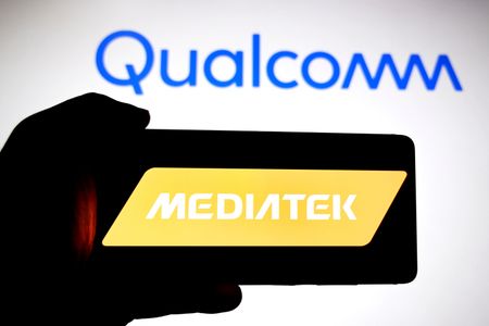 In this photo illustration, the MediaTek logo is seen displayed on a smartphone with the Qualcomm logo in the background.