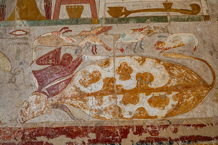 Ancient Egyptian relief scene depicting a table of offerings to honour a deity such as Amun seen inside the Mortuary Temple of Queen Hatshepsut.