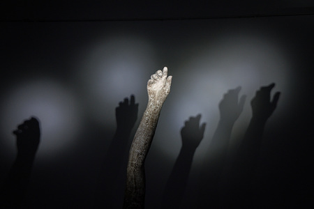 A sculpture seen during the exhibition of Aspasia Stavropoulou with theme the Olive Oil Laboratory of Eleusis. The Olive Oil Laboratory, "Charilaos and Rallis" was built in 1872 on the west coast, until the end of the 1960s, which ended, played an important role in the industrialization of Eleusis and of Greece as a whole. The artist tried to emphasize the worker with sculptures.