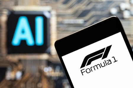 In this photo illustration, the Fédération Internationale de l'Automobile (FIA), Formula 1 (F1), logo seen displayed on a smartphone with an Artificial intelligence (AI) chip and symbol in the background.