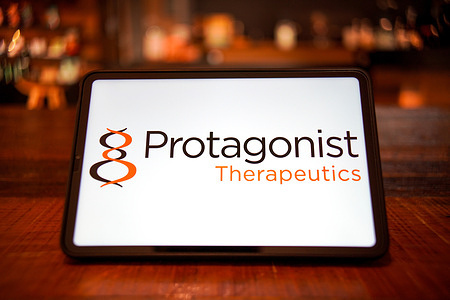 In this photo illustration, the Protagonist Therapeutics logo is displayed on the screen of the smart tablet.