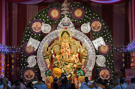 Idol of elephant-headed Hindu god Ganesha adorned with gold and silver ornaments is unveiled at GSB seva mandal in Mumbai. The idol at GSB seva mandal is known as India's richest Ganesha adorned with more than 69 kgs of gold ornaments and more than 336 kgs of silver and other precious items which are usually donated by the devotees. it has also bought an insurance cover of Rs.474.64 crores for the gold and silver ornaments adorning the ganpati idol along with coverage for the volunteers who help in managing and controlling huge number of devotees who come to pray there during the festival.