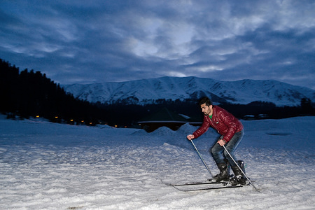 A Kashmiri skier makes his way down a slope at a ski resort in Gulmarg, some 55kms west of Srinagar. Gulmarg, situated in the foothills of The Himalayas, is regarded as one of the leading ski destinations in South Asia.