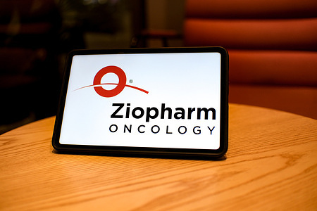 In this photo illustration, the Ziopharm Oncology logo is displayed on a tablet screen.