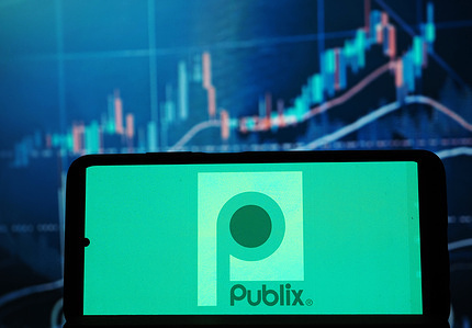 In this photo illustration, the Publix Super Markets logo seen is seen displayed on a smartphone.
