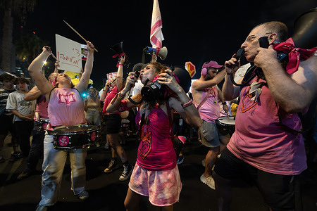 Protesters shout slogans during the demonstration. Tens of thousands of Israelis, joined by families of hostages, staged a massive protest demanding a hostage deal and an end to the war. The demonstration culminated in a large march that coincided with a cabinet meeting in which the Israeli government discussed the continuation of its plan to occupy the Gaza Strip.