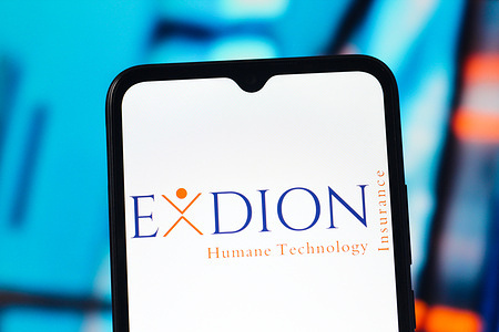 In this photo illustration, the Exdion Insurance logo is seen displayed on a smartphone screen.