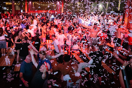 England fans celebrate winning against Norway. Fans pack into The Depot for the quarter-final World Cup game between England and Norway on a big screen. The sell-out event organised by 4TheFans saw over 10000 people come together for their country. Final score, England 2-1 Norway after extra time.