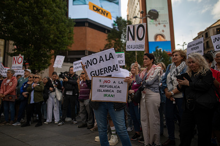 Protesters hold placards during the demonstration. During a rally in Madrid's Plaza de Callao, organized by the platform "PararLaGuerra.es" (Stop the War.es), which published the second edition of the manifesto "Stop the War in the Middle East. Don't Forget Gaza," with over 10,000 signatories, including 234 prominent figures and 253 organizations from 15 countries. The platform was founded on October 29, 2023, denouncing the genocide in Palestine. It has published 10 manifestos and organized 9 nationwide demonstrations.