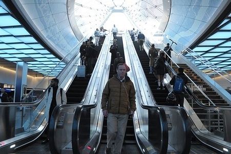 People ride escalators down to Penn Station in Manhattan, New York City.