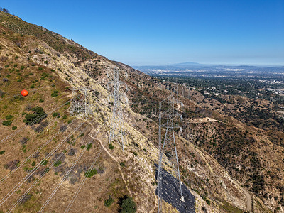 A Southern California Edison Co. electrical transmission tower in Eaton Canyon, which was investigated as a possible origin area of the Eaton Fire, in Pasadena, California, on June 14, 2026. Southern California Edison faced multiple lawsuits alleging its equipment may have been involved in igniting the wildfire that destroyed thousands of structures across Altadena and neighboring communities in January 2025.