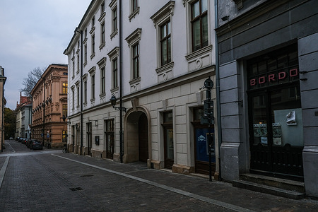 An empty and deserted street next to Krakow's UNESCO listed Main Square during the covid-19 pandemic.
Poland is now passing through the second wave of coronavirus and introduces new restrictive measures such as the closure of stores inside shopping malls, gatherings with a maximum of 5 people, bars and restaurants operating on a takeaway basis among others. Poland has registered more than 615,000 COVID-19 infections and a death toll above 8000.