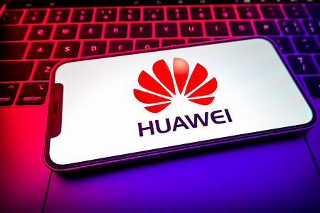 In this photo illustration, a Huawei Investment & Holding logo seen displayed on a smartphone screen.