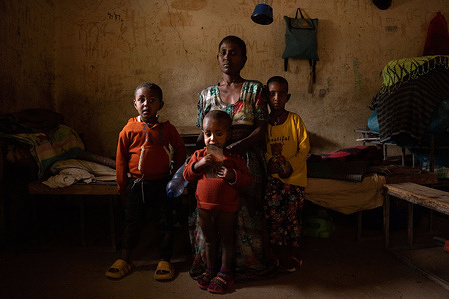 A woman poses with her children in a room at a refugee camp in the town of Adwa. Her husband died there a few months ago from starvation and now they await the same fate as he did. The war in Tigray, Ethiopia, which pitted the TPLF (Tigray People's Liberation Front) against the Ethiopian government, lasted two years (2020-2022) and is considered the bloodiest war of the 21st century. At least 600,000 people were killed, and around 120,000 were subjected to sexual violence.