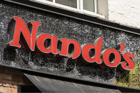 Nando’s logo seen at their Soho restaurant.