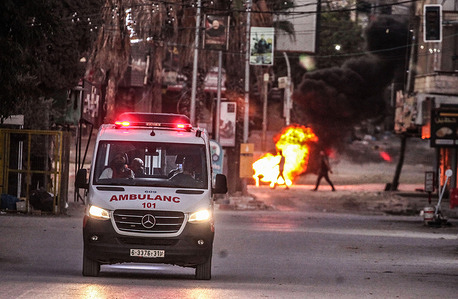 An ambulance transports the body of Palestinian Zahra Amur, 37, to Jenin Governmental Hospital in the city of Jenin, north of the occupied West Bank. Israeli special forces killed Amur during a raid to arrest wanted persons in the Palestinian village of Anza. Four others were injured, some seriously.