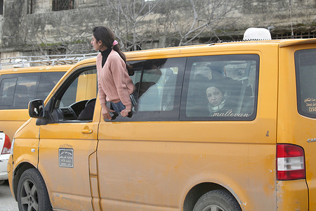 A Palestinian girl waits at the window of their car at an Israeli military checkpoint in the northern West Bank near Nablus. Israeli forces closed all checkpoints at the entrances to areas under the control of the Palestinian Authority, headed by President Mahmoud Abbas, after Israel and the United States launched airstrikes against the Islamic Republic of Iran.