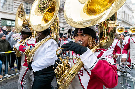 Members of a US high school marching band seen during the parade. Performers, marching bands, dancers, and decorated floats filled the streets of central London as the annual London New Year Parade processed from Piccadilly to Whitehall, marking the start of the year with a large public celebration. International marching bands and community groups showcased music, culture, and pageantry as crowds lined the route to watch the spectacle.