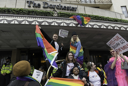 Protesters are seen holding LGBTIQ flags and placards in front of the Dorchester Hotel during the Protest condemning the new anti-LGBTIQ laws brought in by the Sultan of Brunei. 
Protesters gathered outside of the luxury Dorchester hotel in London, UK which is owned by the Sultan of Brunei Hassanal Bolkia, to protest new anti-LGBTIQ laws brought in by the Sultan. 
Under the new laws introduced in Brunei those found guilty of gay sex or adultery could be stoned to death. Some celebrities have voiced opposition to the regime and called for a boycott of hotels owned by the sultan.