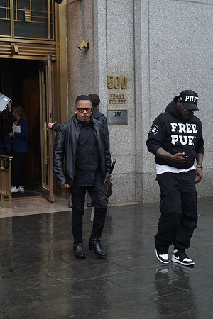 Justin Dior Combs (son of Sean Combs) and family friend wearing a FREE PUFF hoody exit Federal Court in New York after attending first day of Jury Selection. Sean Combs (Puff Diddy) trial for federal sex trafficking.
