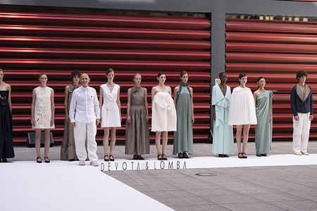 Models parade with Devota Y Lomba design during OMODA and Fashion Week Museo Reina Sofía in Madrid.