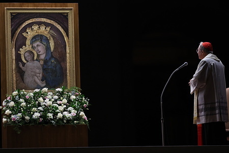 Cardinal Arthur Roche, Prefect of the Dicastery for Divine Worship and the Discipline of the Sacraments, leads the prayer of the Holy Rosary for Pope Francis in the square in front of St. Peter's Basilica. For the ninth consecutive evening, the Rosary was recited in St. Peter's Square for Pope Francis' recovery. The pope remains hospitalized at the Gemelli Polyclinic due to pneumonia.