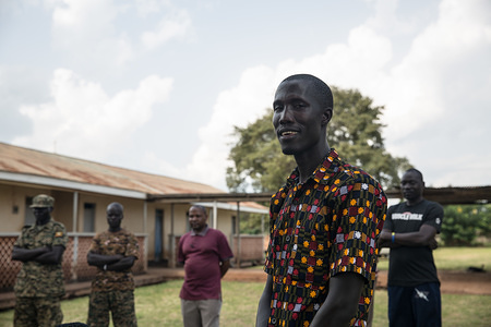 David Ocitti, who runs an NGO Pathways to Peace, seen during the family reunion between three escapees and their families, who hadn't seen them in sixteen years. The men were abducted as kids by the Lord's Resistance Army, a rebel group that terrorized northern Uganda.