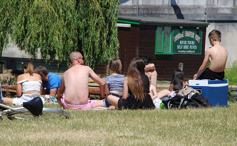 Families sit together on the grass by the river on a warm and sunny day during the covid 19 crisis.
The UK government relaxed the guidelines on coronavirus lockdown, allowing people to spend more time outdoor as the death rate continues to drop.