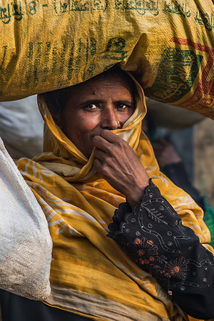 A Rohingya woman covers her face for a photo in Kutupalong refugee camp in Cox's Bazar. More than 800,000 Rohingya refugees have fled from Myanmar Rakhine state since August 2017, as most of them keep trying to cross the border to reach Bangladesh every day.