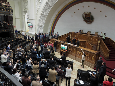 Deputies applaud foreign diplomats during a session of Venezuela's National Assembly. Foreign diplomats expressed solidarity with the increasingly cornered congress. During session, the lawmakers announced they would open a probe into the responsibles of the government´s attempt to “dissolve” the congress.