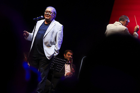 Portuguese singer Fernando Tordo performs live at a concert at the Coliseu do Porto, in tribute to the poet and composer José Carlos Pereira Ary dos Santos, alongside the Portuguese Symphonic Band.