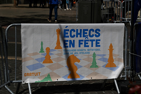 A banner from the "Echecs en Fête" event is seen hanging on a fence for the 6th edition of Chess Festival in Marseille. 6th edition of Chess Festival in Marseille, France.