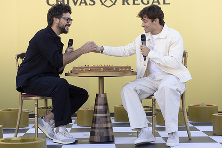 (L-R) Álvaro Morte and Charles Leclerc attend the 'Official launch of Chivas Regal 16' Photocall at Hotel Metropolis in Madrid.