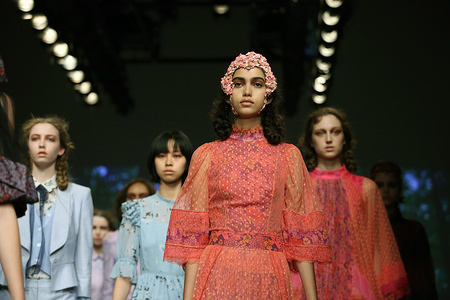 LONDON, UNITED KINGDOM - 2018/09/14: A models walk the runway at the based Turkish designer BoraAksu during London Fashion Week September 2018 at BFC Show Space.