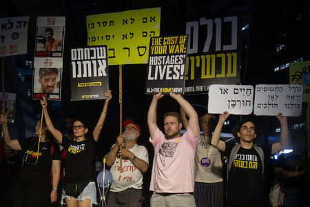 Protesters hold placards expressing their opinion during the demonstration. At the weekly demonstrations in Hostages Square calling for the release of all the hostages and an end to the war, tens of thousands of protesters called on the Israeli government not to abandon the hostages, to end the war, and not to occupy Gaza.