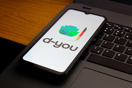 In this photo illustration, the Deutsche EUDI-Wallet d-you logo is seen displayed on a smartphone screen.