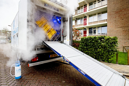 Shopping baskets being sterilized by a machine.
Due to the outbreak of the COVID-19 coronavirus in the Netherlands, Jumbo Supermarket has deployed a mobile sterilization machine which is install in a truck to sterilize the over 30,000 shopping baskets across its 77 stores in the Netherlands to ensure the safety f its customers.