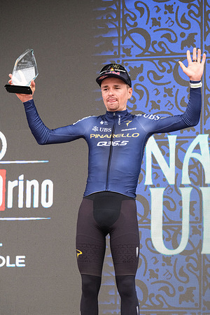 Tom Pidcock, Pinarello-Q36.5 Pro Cycling Team, receives the "MITO 150" award celebrating 150 years since the first edition of the race, during the award ceremony of the Milano-Torino 2026 at Basilica di Superga.