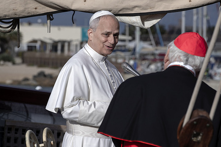 Pope Leo XIV delivers his speech during a visit at the "Med 25 Bel Espoir" Peace Training Ship, anchored in the port of Ostia, near Rome