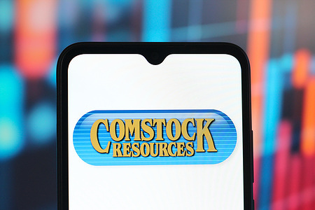 In this photo illustration, the Comstock Resources logo is seen displayed on a smartphone screen.